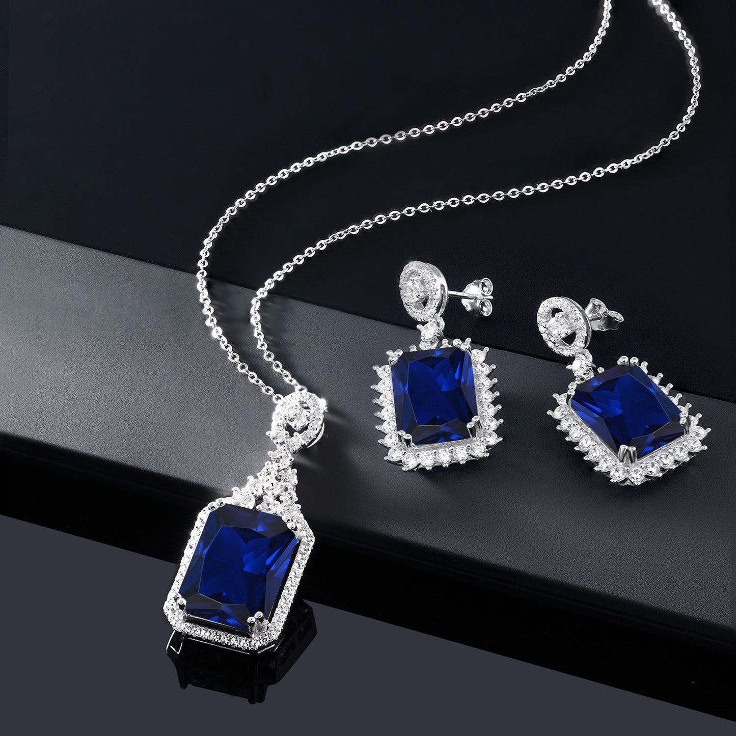31.10 Cttw Blue Created Sapphire Pendant and Earrings Jewelry Set For Women In 925 Sterling Silver | Emerald Cut 14X10MM | With 18 Inch Chain